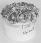 Artificial flower decoration with a box